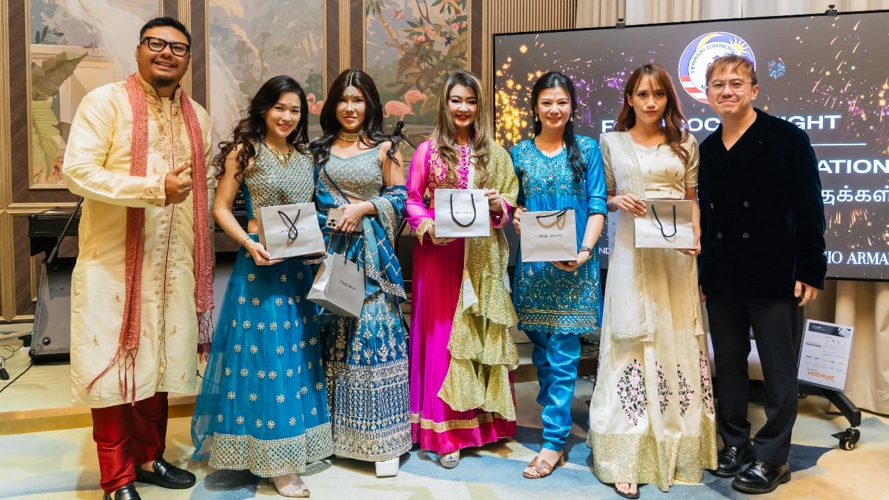 Abu Rizal and the winning ladies of the best-dressed competition with Kerson Tai of Giorgio Armani’s The Exchange TRX boutique (right).