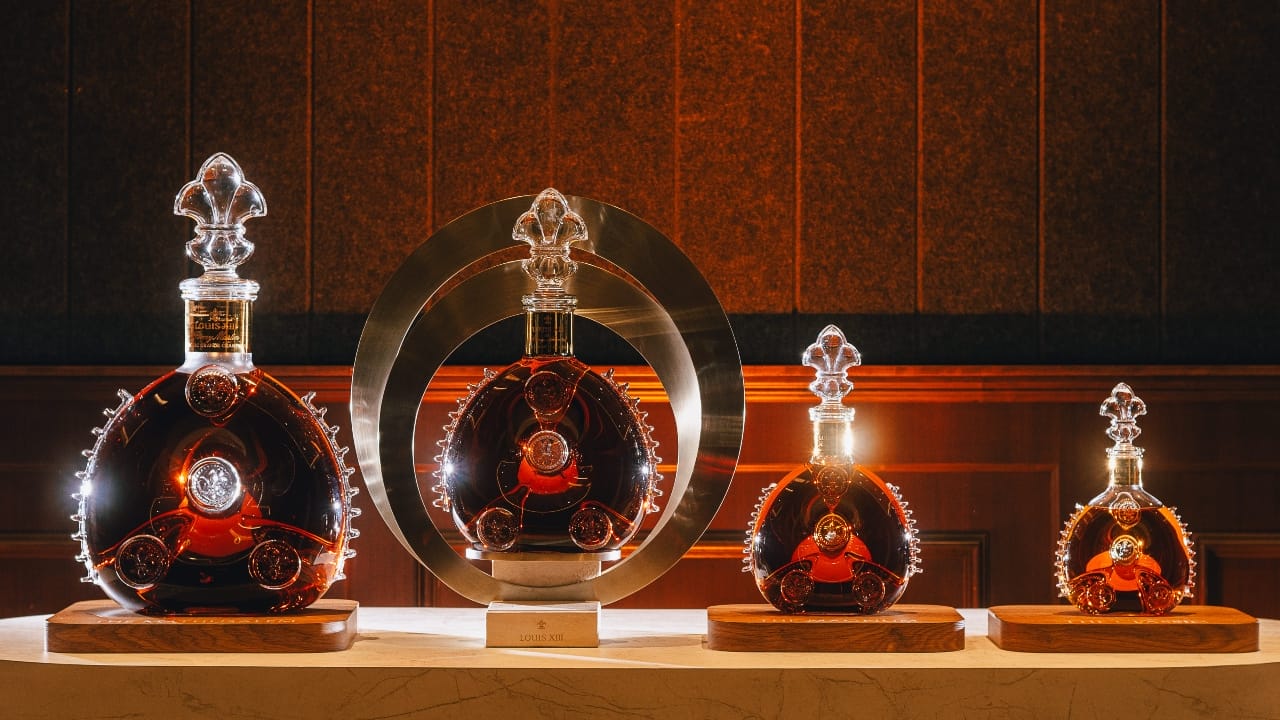 Louis XIII bottled in various decanter sizes.