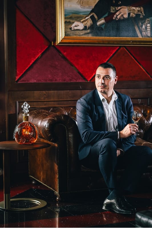 Crafted by time, mastered by vision—Baptiste Loiseau, the youngest Cellar Master in Louis XIII's history, carries forward a legacy of 150 years, blending tradition, innovation, and sustainability into every precious drop of the King of Cognacs.