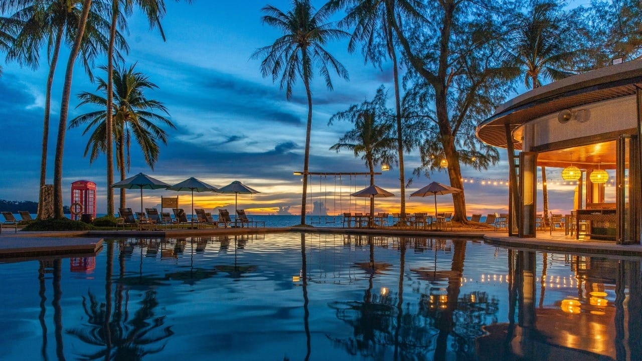 Sunset by the swimming pool at Saii Laguna Phuket.